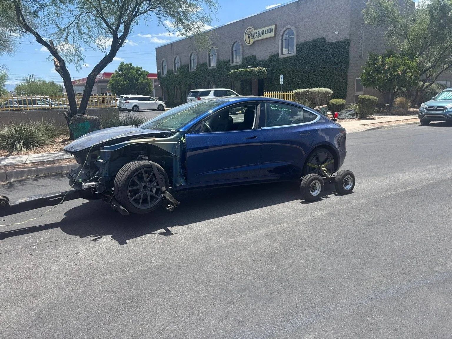 Technician performing a damage-free vehicle lockout service