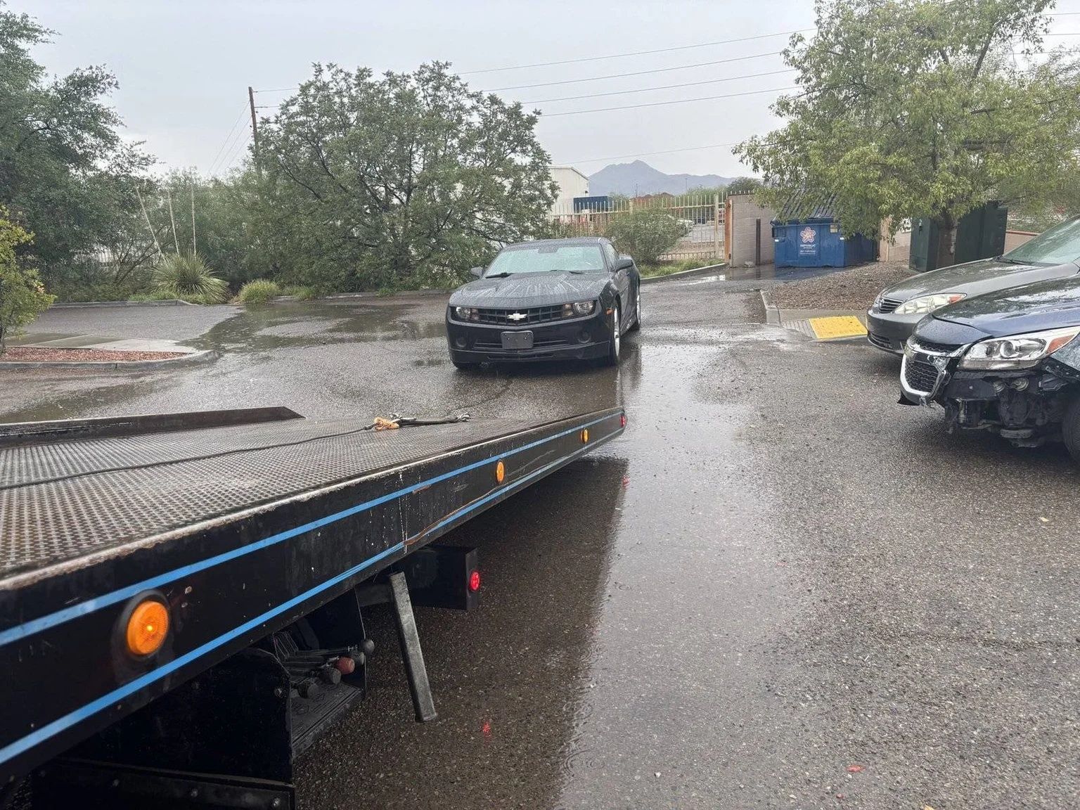 Fuel being delivered to a stranded vehicle on a Tucson roadside
